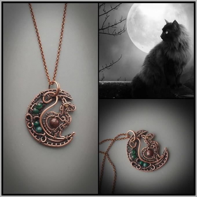 Emerald and garnet cat necklace